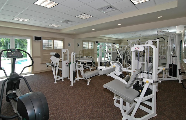 401 N Point Rd Unit 901, Osprey, FL 34229 - workout area featuring carpet, a drop ceiling, and baseboards