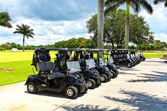 401 N Point Rd Unit 901, Osprey, FL 34229 - view of property's community featuring a lawn and view of golf course