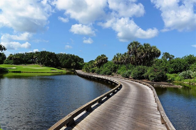 401 N Point Rd Unit 901, Osprey, FL 34229 - view of community with a water view and view of scattered trees