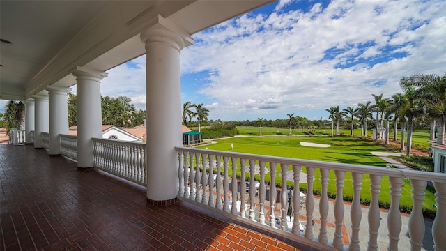 401 N Point Rd Unit 901, Osprey, FL 34229 - balcony featuring view of golf course and covered porch