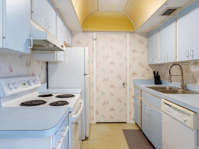 kitchen with tasteful backsplash, white appliances, white cabinetry, and sink