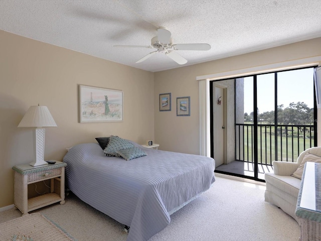 bedroom with light colored carpet, access to exterior, ceiling fan, and a textured ceiling