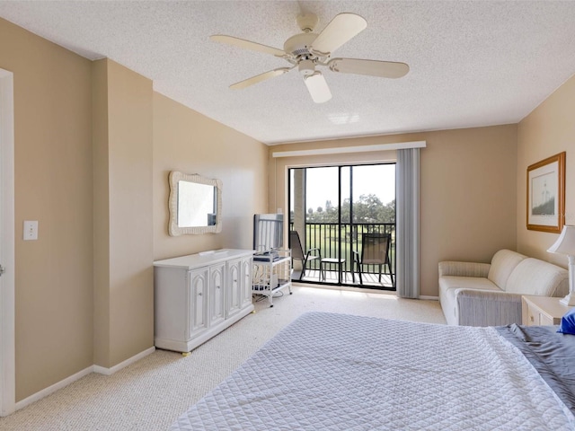 bedroom featuring light colored carpet, access to outside, ceiling fan, and a textured ceiling