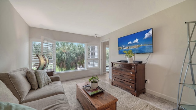 living room featuring a healthy amount of sunlight