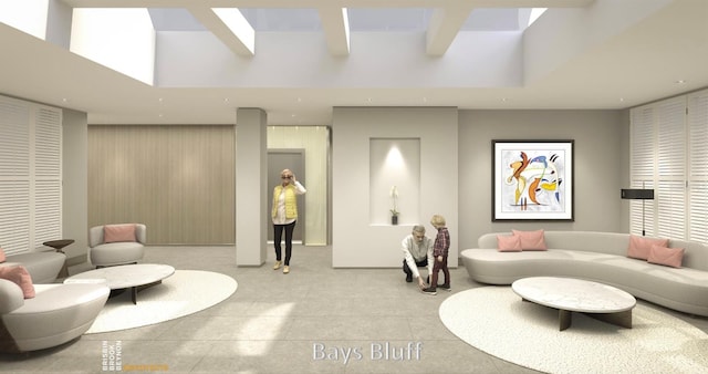 living room featuring light tile floors and a high ceiling