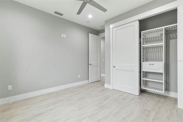 unfurnished bedroom featuring a closet and ceiling fan