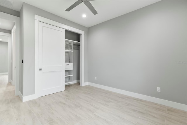 unfurnished bedroom with a closet and ceiling fan