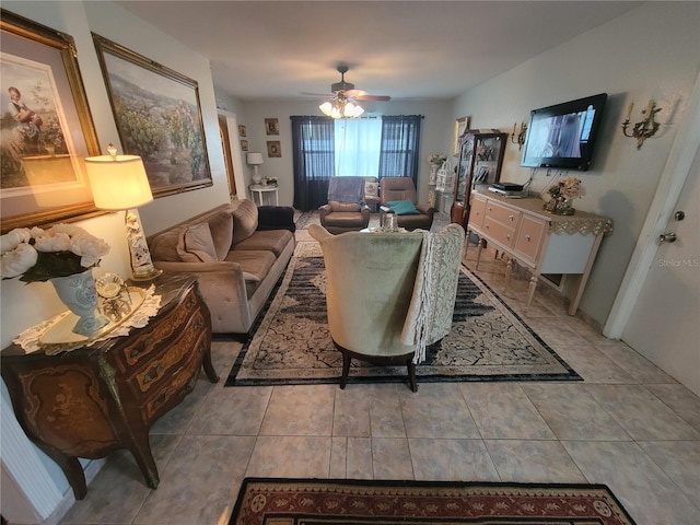 tiled living room featuring ceiling fan