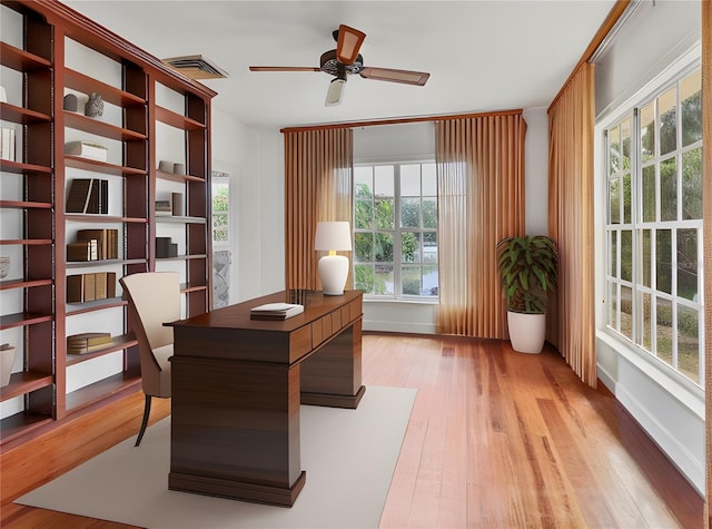 office area featuring light hardwood / wood-style floors and ceiling fan