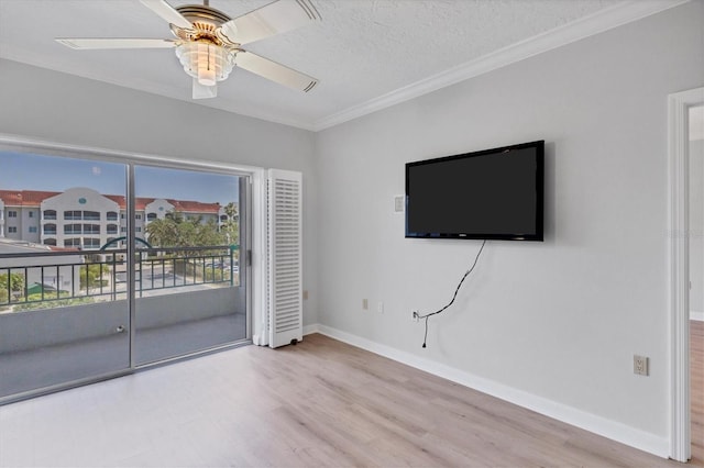 unfurnished living room featuring light hardwood / wood-style flooring, ceiling fan, crown molding, and a textured ceiling