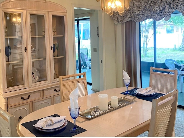 dining area with a chandelier