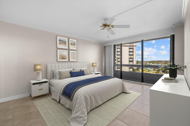 tiled bedroom with access to exterior, ceiling fan, crown molding, and a textured ceiling