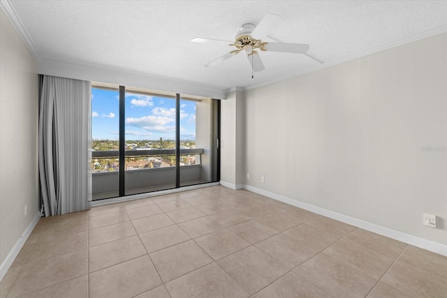 tiled spare room featuring crown molding, ceiling fan, and a textured ceiling