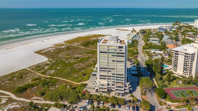 aerial view featuring a water view and a view of the beach