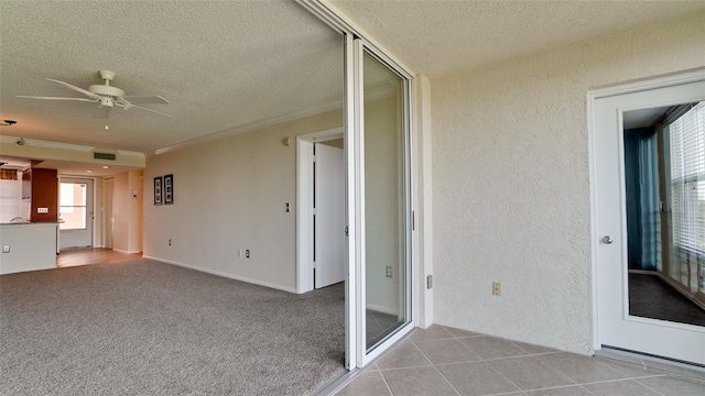 interior space with ceiling fan