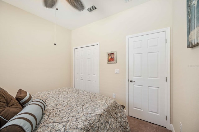 bedroom featuring ceiling fan and carpet floors