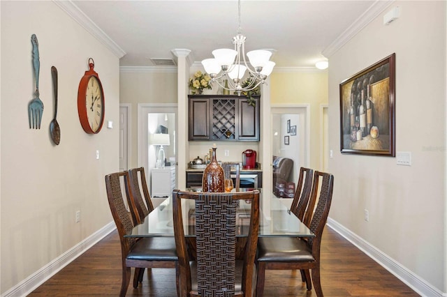 dining room featuring crown molding, dark hardwood / wood-style floors, and a chandelier