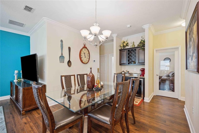 dining room featuring crown molding, an inviting chandelier, and dark hardwood / wood-style flooring