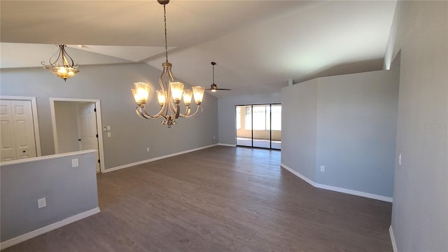 empty room featuring ceiling fan, vaulted ceiling, and dark hardwood / wood-style flooring