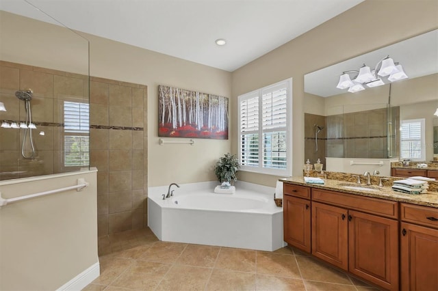 bathroom featuring vanity, plus walk in shower, and tile patterned floors