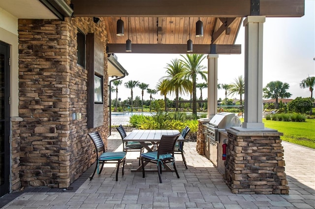 view of patio / terrace with a grill and area for grilling