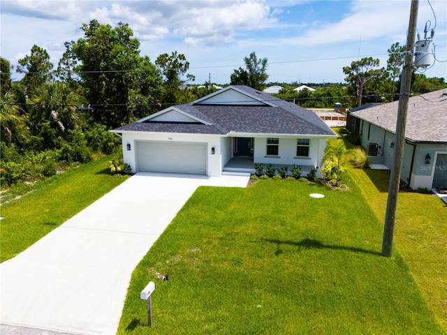 ranch-style home with a garage and a front yard