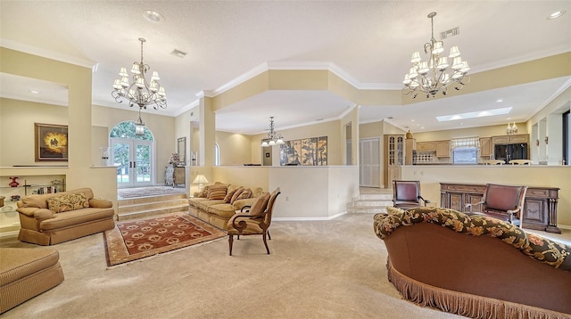 carpeted living room with crown molding and french doors