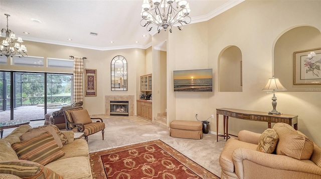 living room with light carpet, an inviting chandelier, and crown molding