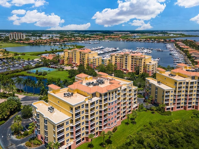 birds eye view of property featuring a water view