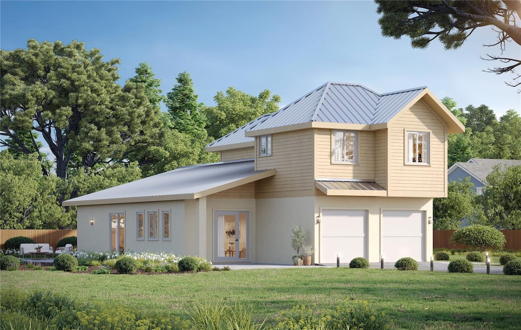 view of front of property featuring a garage and a front yard