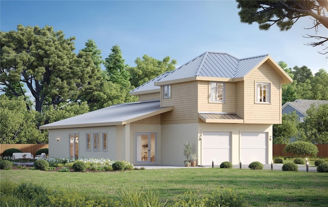 view of front of property featuring a garage and a front yard