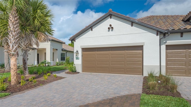 view of front of property featuring a garage