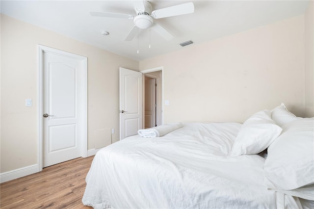 bedroom featuring ceiling fan and light wood-type flooring