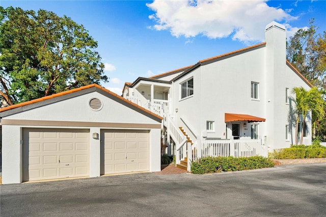 view of front of property with a garage