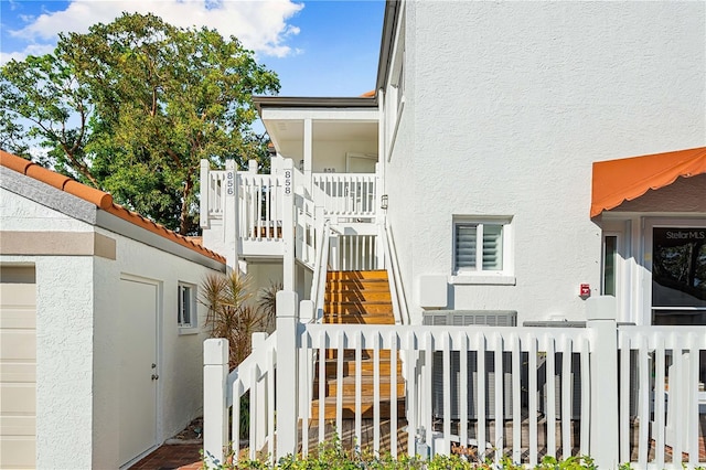 view of property exterior with central AC unit