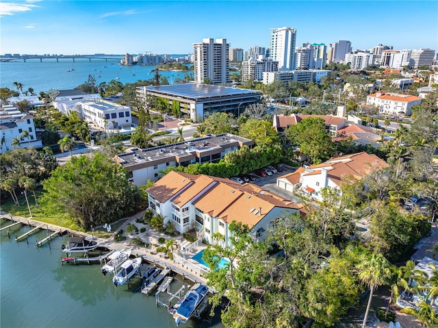 birds eye view of property featuring a water view