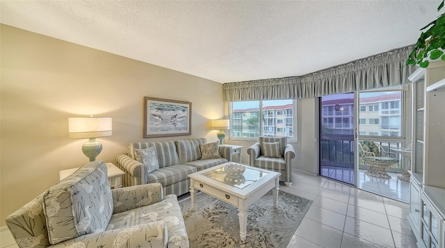 living room featuring a textured ceiling and light tile flooring