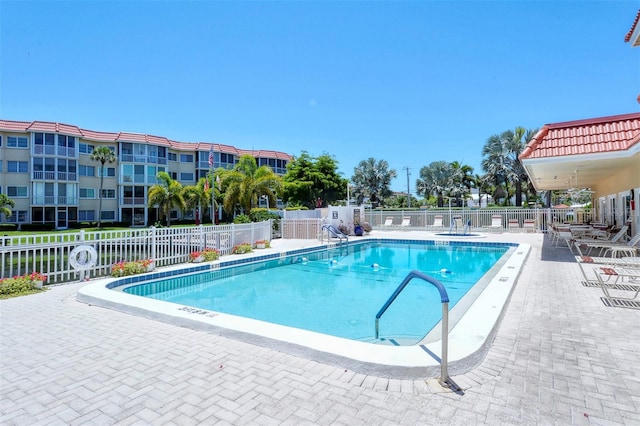 view of swimming pool featuring a patio