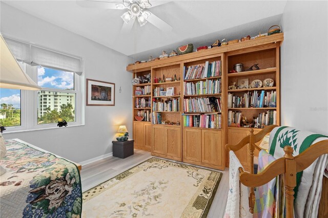 interior space with light wood-type flooring and ceiling fan