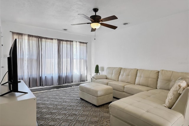 living room featuring ceiling fan