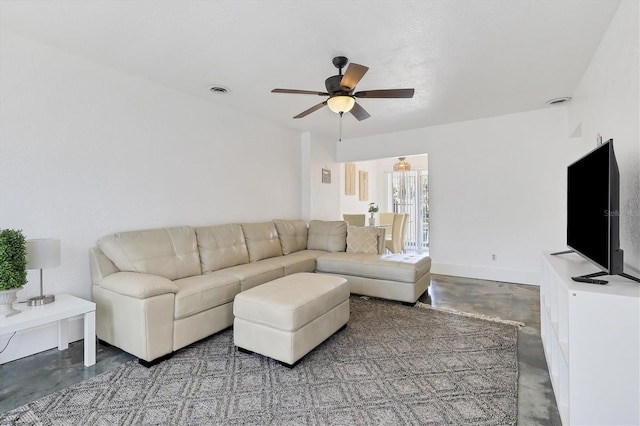 living room featuring ceiling fan