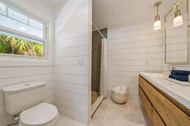 bathroom featuring a textured ceiling, tile patterned floors, toilet, vanity, and curtained shower