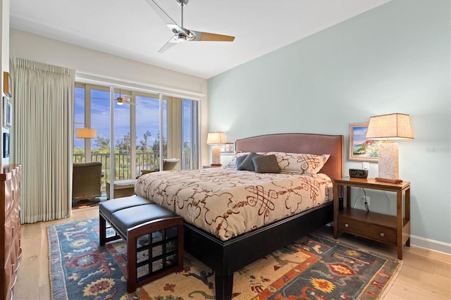 bedroom featuring ceiling fan, access to exterior, and light hardwood / wood-style flooring