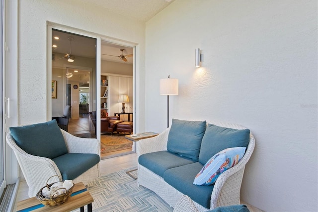 interior space featuring ceiling fan and hardwood / wood-style flooring