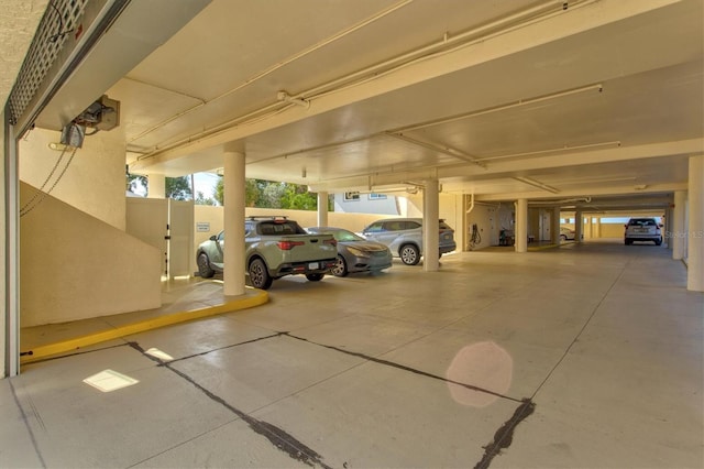 garage featuring a carport