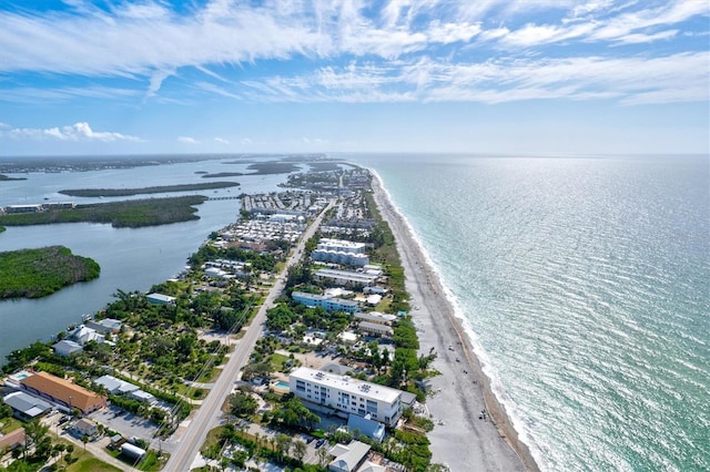 aerial view featuring a water view and a view of the beach