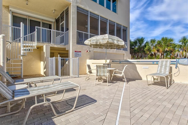 view of patio with ceiling fan