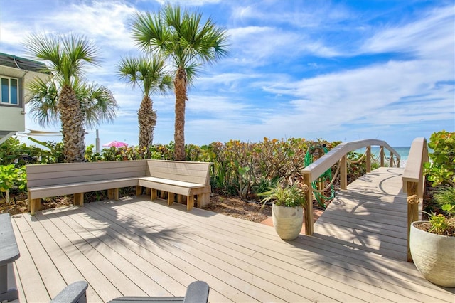 deck featuring a water view