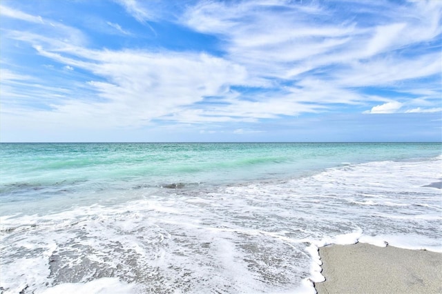 view of water feature with a beach view