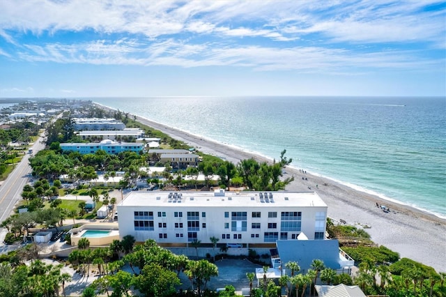 aerial view featuring a view of the beach and a water view